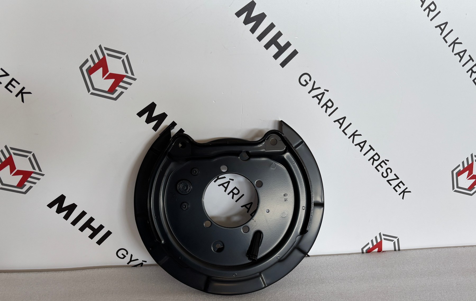 Mitsubishi Grandis jobb hátsó rögzítőfék-szerelőlap MN116268